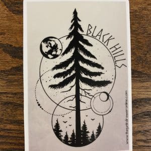 Black Hills sticker with a circular design and a large tree as the focal point