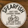 Spearfish sticker with a bicycle and the text craft beer expensive housing a shit load of bikes and college students