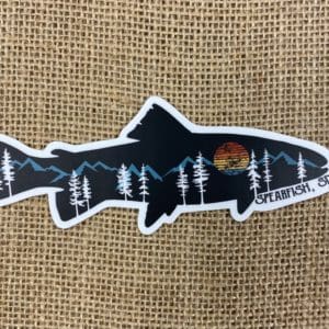 Spearfish, SD sticker in a fish shape with hills, trees, and a sun design within the fish shape.