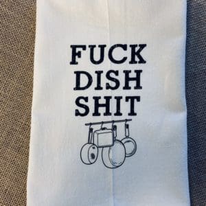 Fuck Dish Shit text above a drawn image of kitchenware custom towel