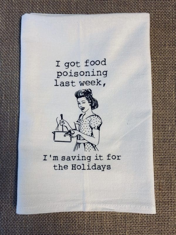 I got food poisoning last week text above a drawn image of a woman cooking with I'm saving it for the holidays below on a custom towel