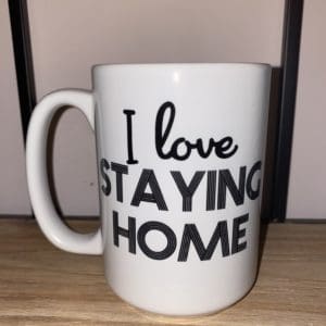 Custom mug with I Love STAYING HOME text