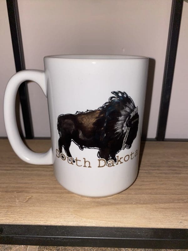 Custom mug with a drawn buffalo above South Dakota text