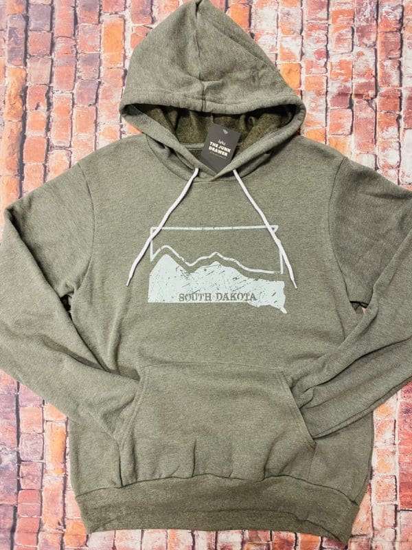 light blue South Dakota state shape design with hills going through it printed on grey heathered hoodie with contrast drawstrings