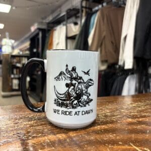 JESUS DINO RIDE AT DAWN CERAMIC MUG