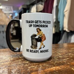 TRASH GETS PICKED UP CERAMIC MUG
