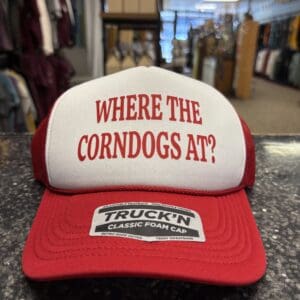 WHERE THE CORNDOGS AT TRUCKER HAT