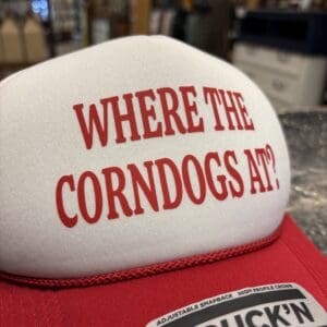 WHERE THE CORNDOGS AT TRUCKER HAT
