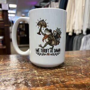 WE THRIFT AT DAWN CERAMIC MUG