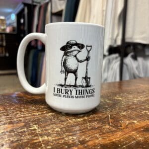 I BURY THINGS CERAMIC MUG